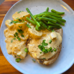 Creamy Slow Cooker Pork Chops with potatoes and a side of green beans