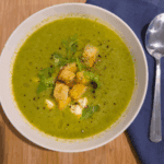a bowl of broccoli pea and creamy ricotta soup