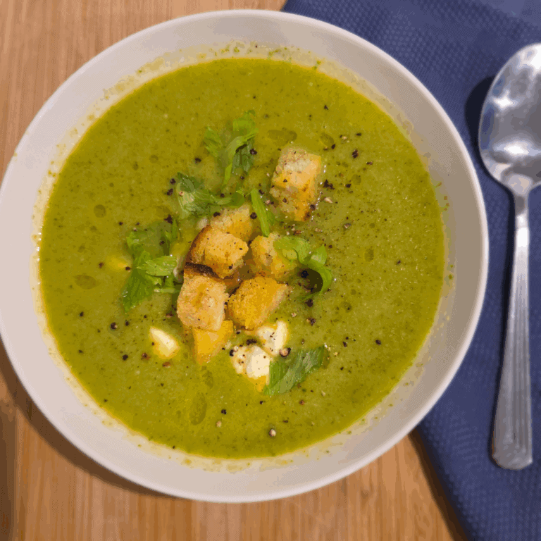 a bowl of broccoli pea and creamy ricotta soup