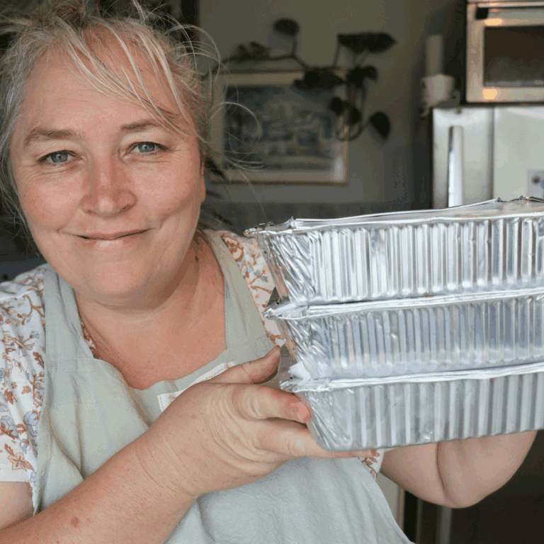 Stacey Scott, Farmer's wife homestead with three containers of freezer meals