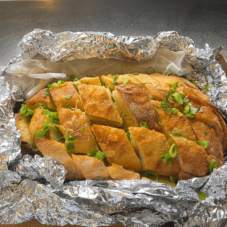 “Pull-apart cheesy garlic bread fresh from the oven.”