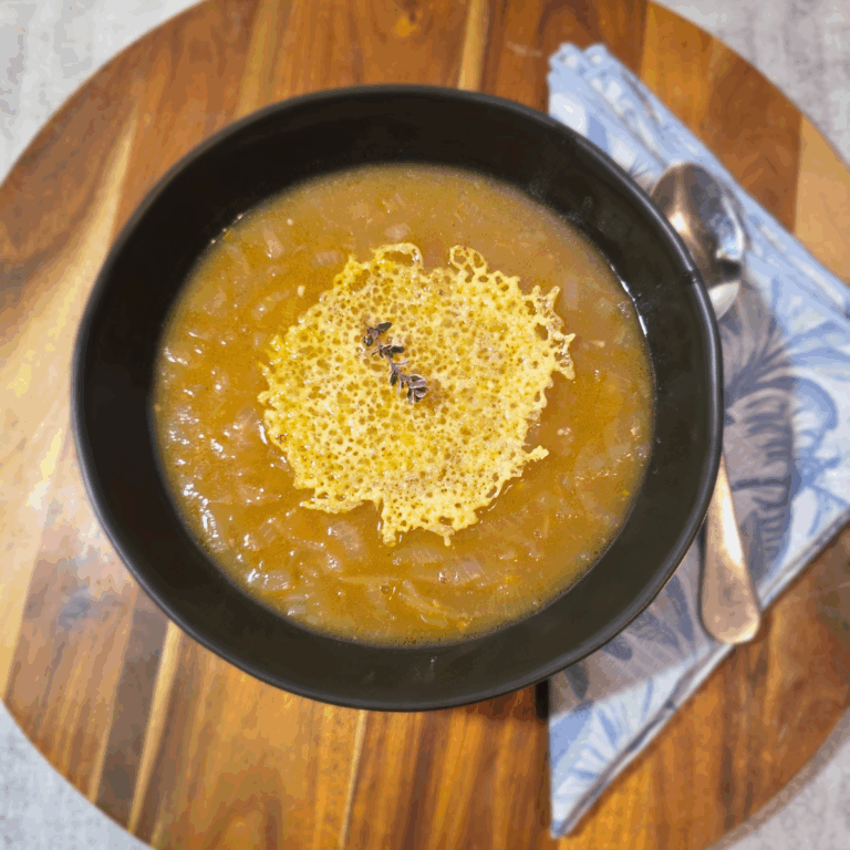 a bowl of French Onion Soup with Cheese Crisp
