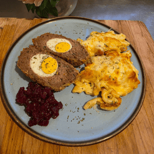 Homemade Scotch eggs with golden crumb coating