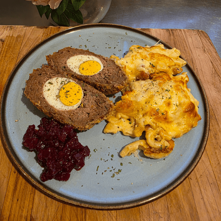 Homemade Scotch eggs with golden crumb coating