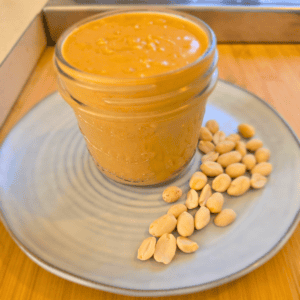 Homemade peanut butter in a glass jar