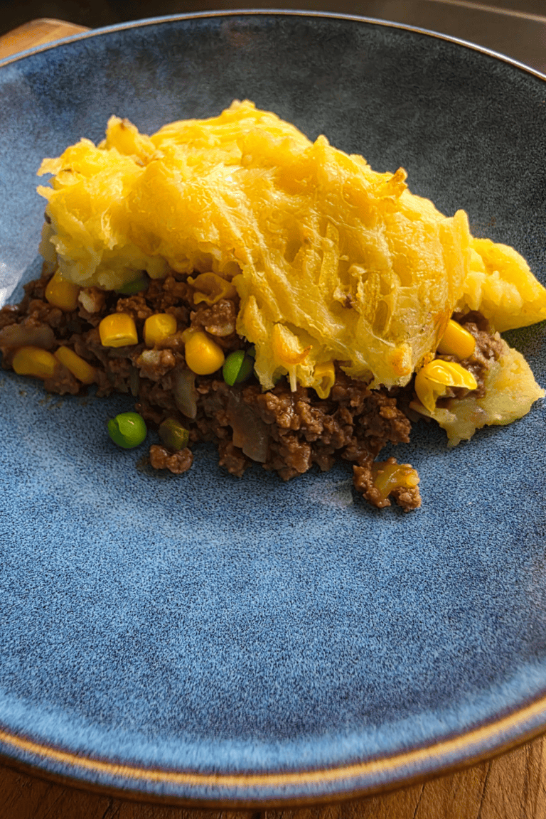 Homemade beef cottage pie with savoury mince, vegetables and cheesy mashed potato