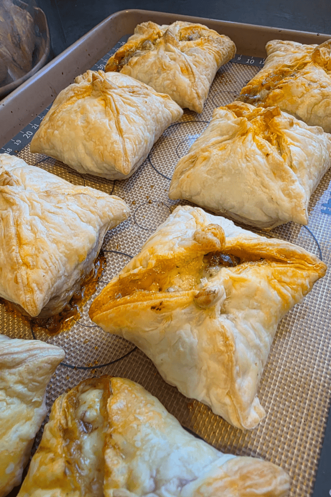 Homemade mini mince and cheese pies baked until golden in flaky puff pastry