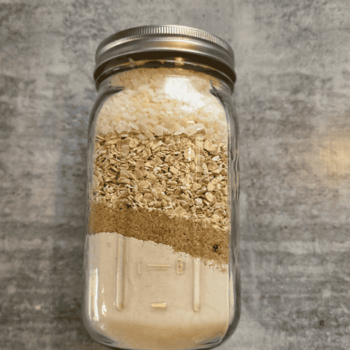 jar of dry pantry mix Anzac biscuits