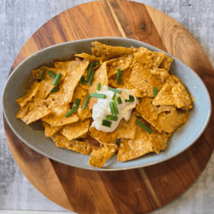 Crispy Chicken Taco Bake with cheese and corn chips