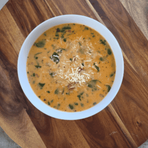Marry Me Chicken Gnocchi Soup with cooked chicken, sun-dried tomatoes and spinach