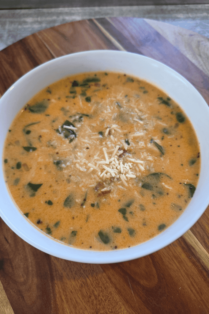 Marry Me Chicken Gnocchi Soup with cooked chicken, sun-dried tomatoes and spinach